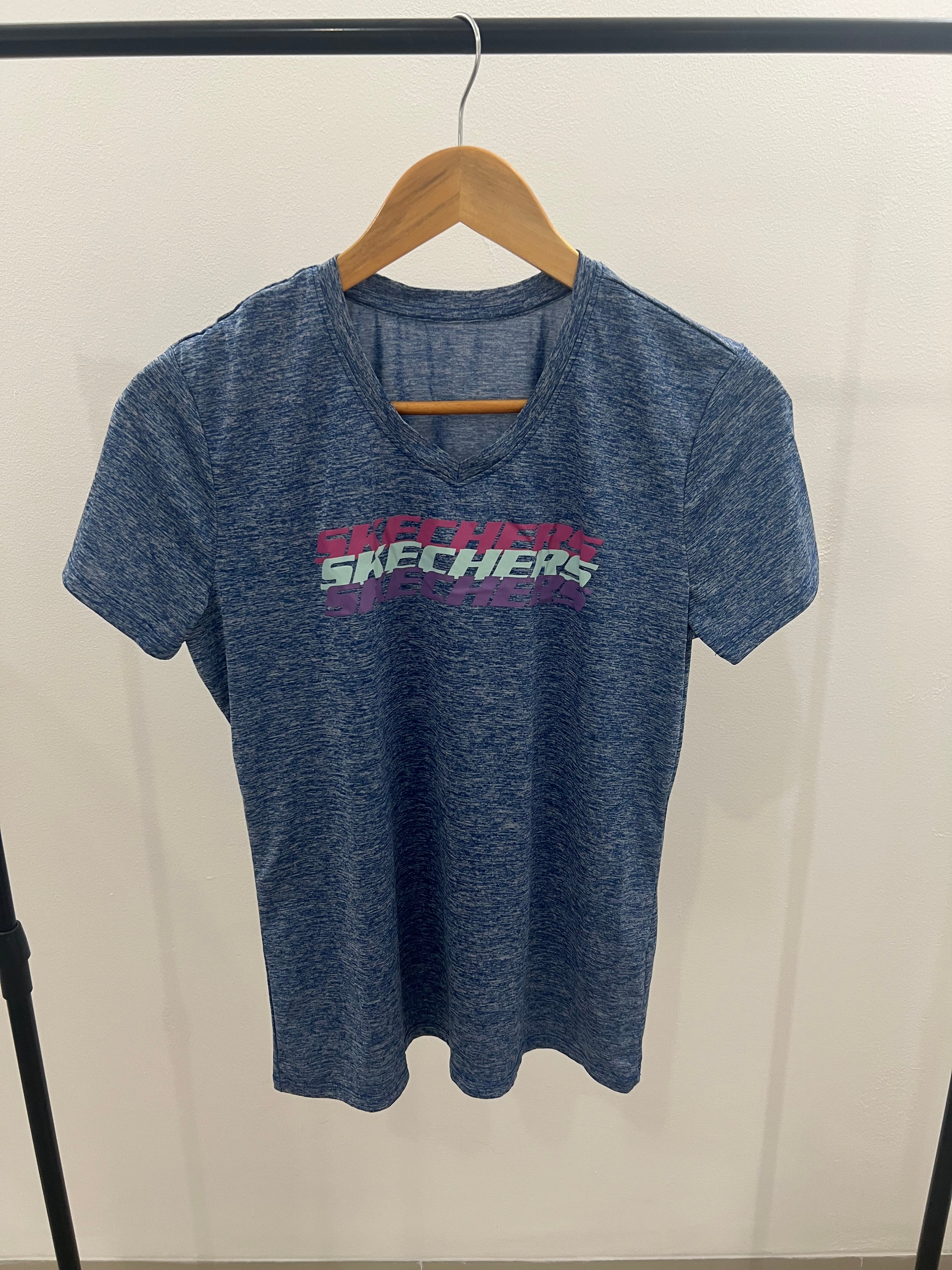 Polo azul Skechers-Talla:S