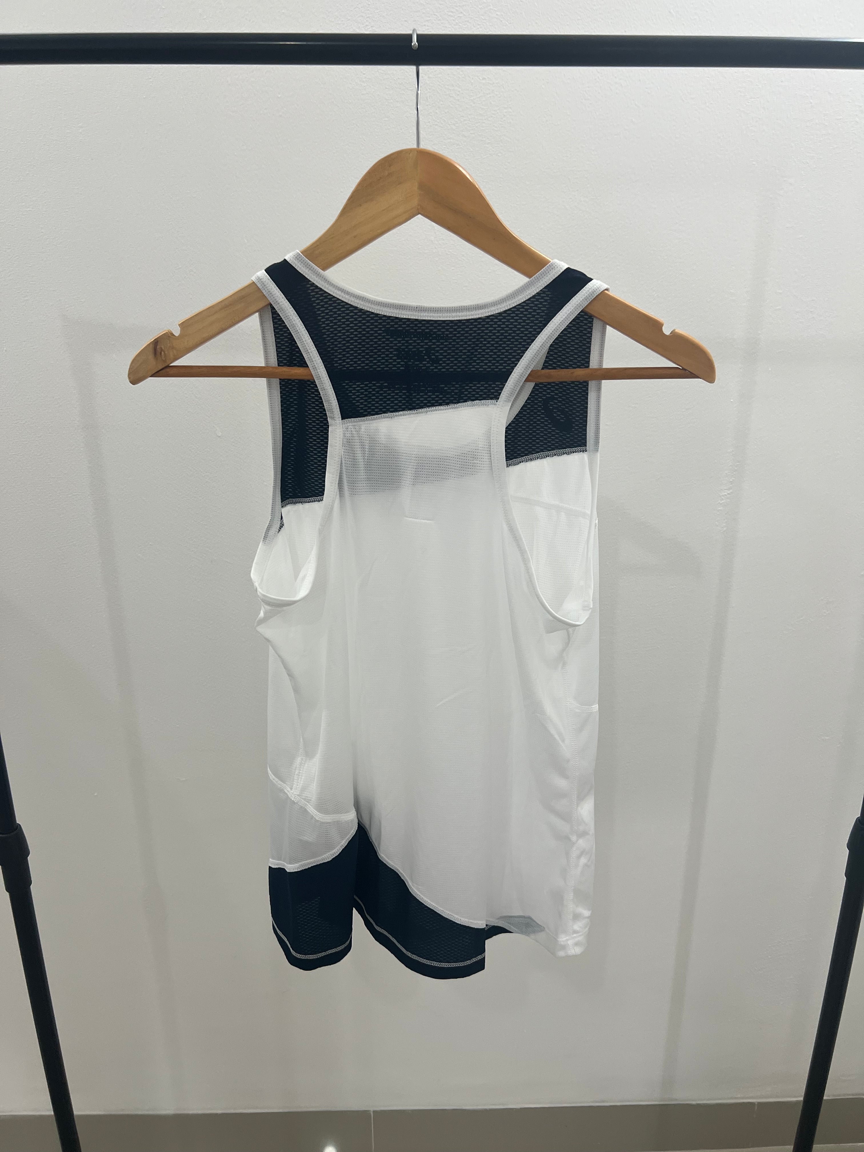 Polo deportivo asics- Talla: S